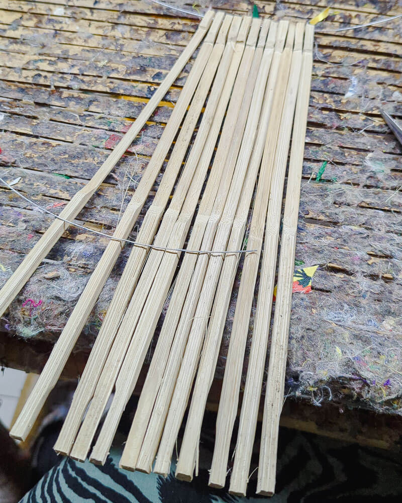 Bamboo sticks tied together with wire to make a lantern