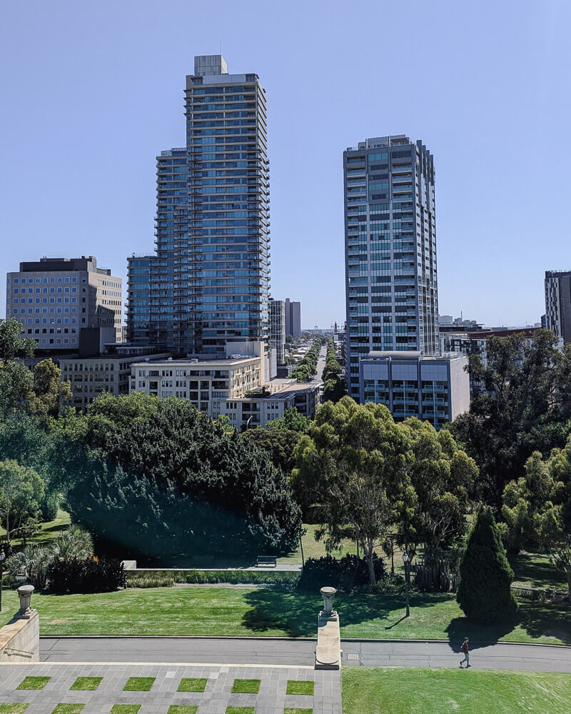 View of skyscraper buildings in Melbourne CBD from Kings Domain park
